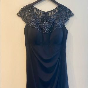 Xscape embellished- neck gown in Navy. Excellent used condition. Worn once.